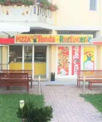Negozio e attività di pizzeria al trancio Negozio e attività di pizzeria al trancio