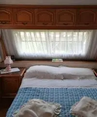Roulotte con preingresso e pompeiana camping Roana Roulotte con preingresso e pompeiana camping Roana