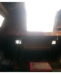 Cabinato a vela in legno da restaurare