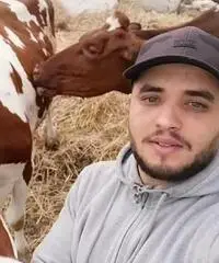 Contadino ,conducente del trattore , allevatore di Contadino ,conducente del trattore , allevatore di